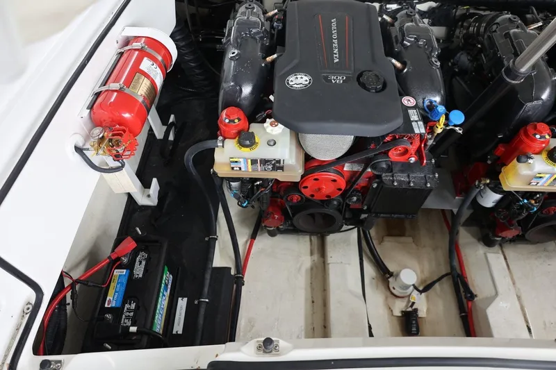 Slide: The Image of Engine compartment of a 2021 Cobalt R30 boat featuring a Volvo Penta 300 V8 engine. - 57