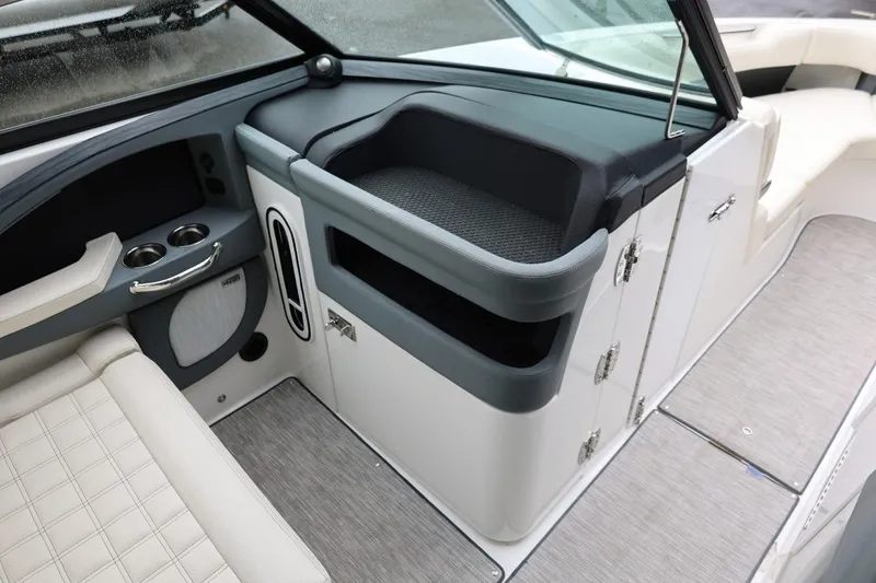 Slide: The Image of Interior of 2021 Cobalt R30 boat featuring seating and storage compartments. - 59