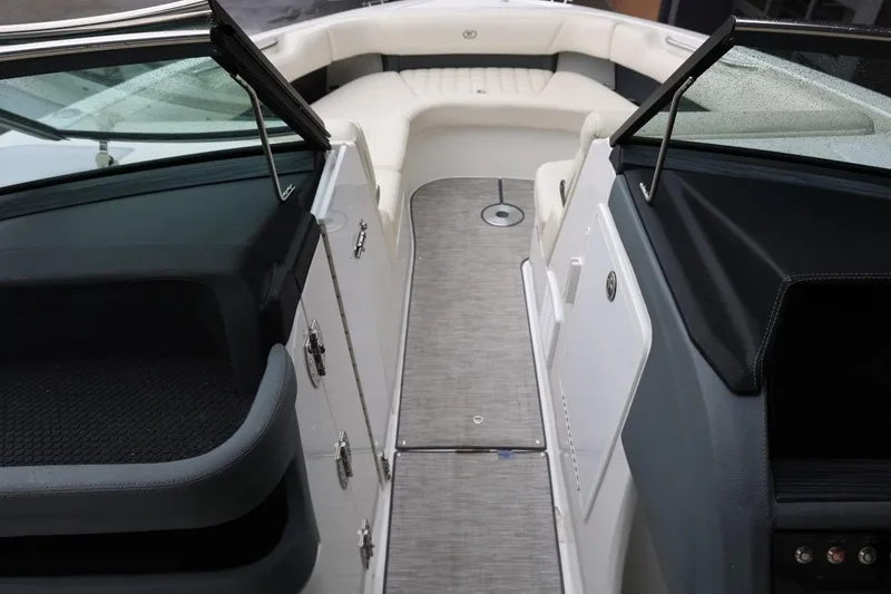 Slide: The Image of Interior view of a 2021 Cobalt R30 boat, featuring sleek seating and modern design. - 64