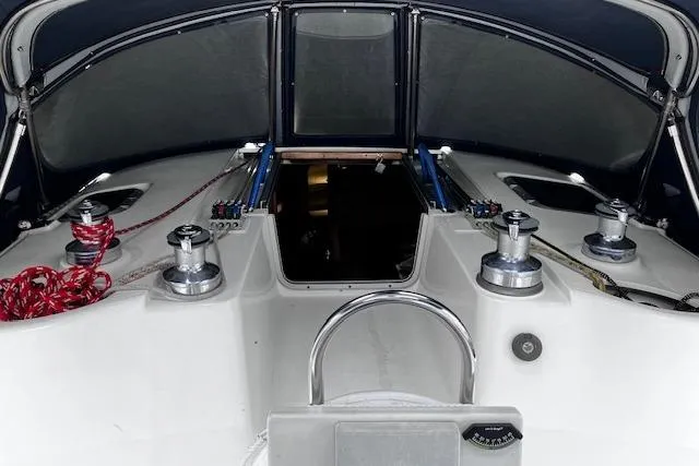 Slide: The Image of Cockpit of a 1996 Hunter 430 sailboat with winches and ropes. - 11