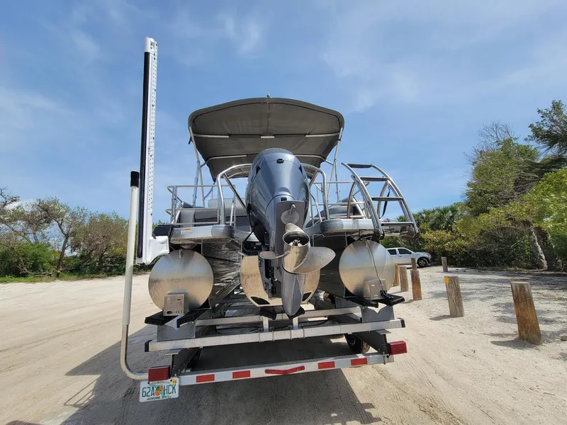 Slide: The Image of Rear view of a 2021 GODFREY MARINE Monaco boat on a trailer. - 11