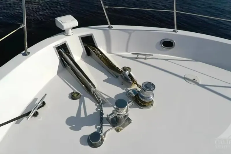 Slide: The Image of Bow deck of 2003 Jefferson Pilothouse 53 yacht with anchor and winch system. - 17