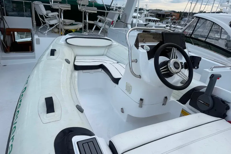 Slide: The Image of 2003 Jefferson Pilothouse 53 yacht interior with steering wheel and seating area. - 20