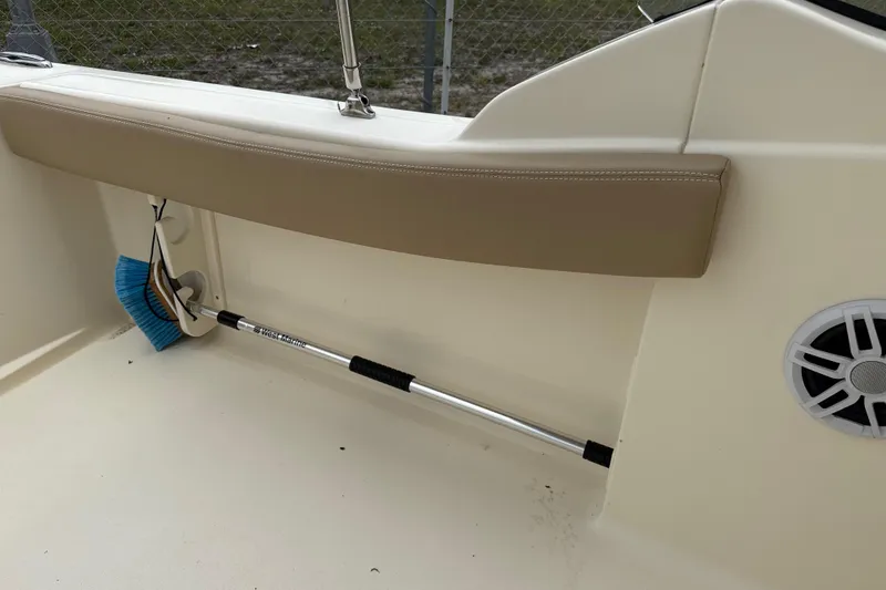 Slide: The Image of 2023 Scout 215 Dorado boat interior with brush and speaker. - 15