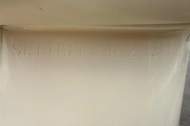 Slide: The Image of 2023 Scout 215 Dorado hull identification number (HIN) etched on boat surface. - 39