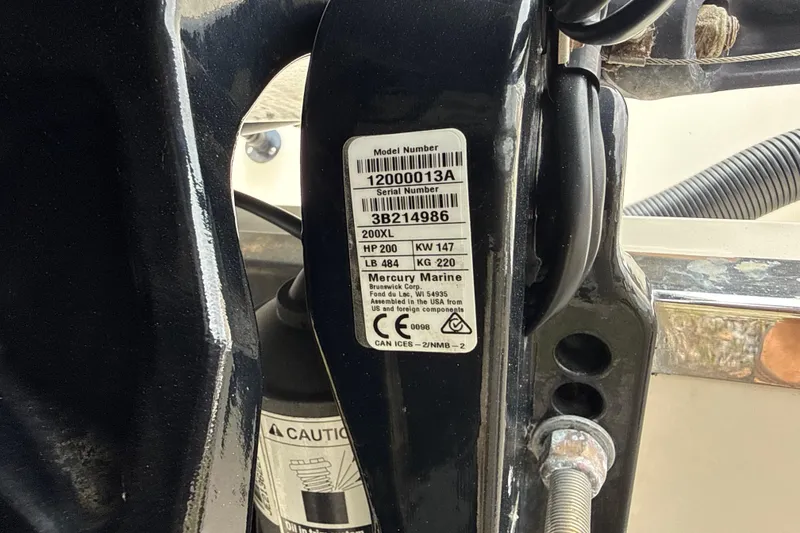 Slide: The Image of Label on 2023 Scout 215 Dorado boat engine, displaying model and serial numbers. - 40