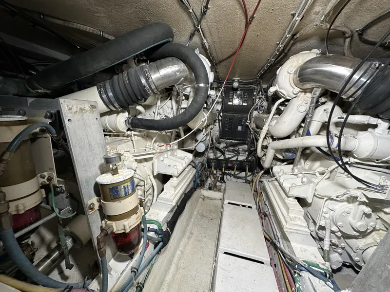 Slide: The Image of Engine room of a 1992 Hatteras 50 Convertible yacht with twin engines. - 41