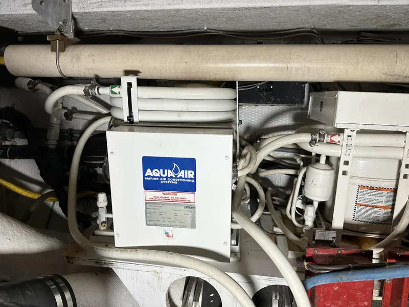 Slide: The Image of Aquair marine air conditioning unit in a 1992 Hatteras 50 Convertible yacht. - 44