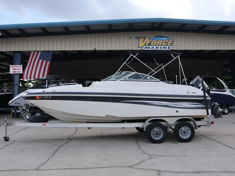 The Image of 2008 NauticStar 210 DC boat on trailer at VForce Marine. - 1