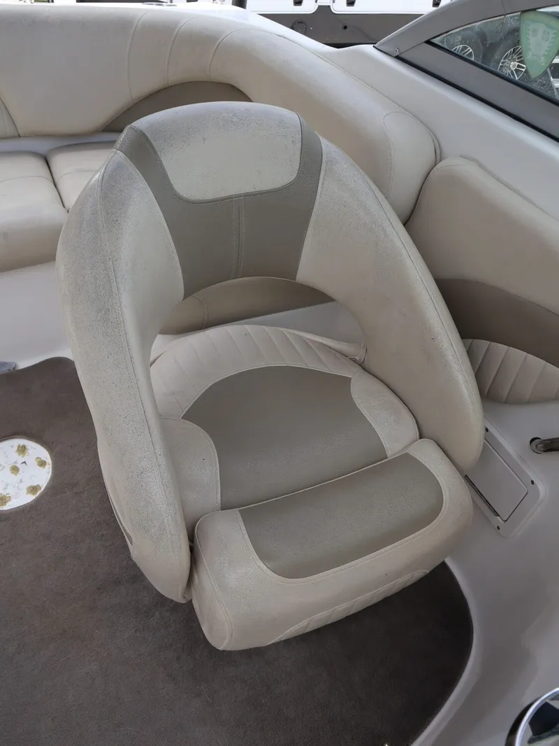 Slide: The Image of NauticStar 210 DC 2008 boat seat in beige leather. - 16