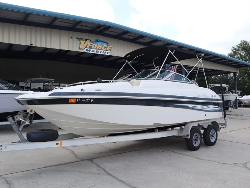 Slide: The Image of 2008 NauticStar 210 DC boat on trailer at VForce Marine. - 3