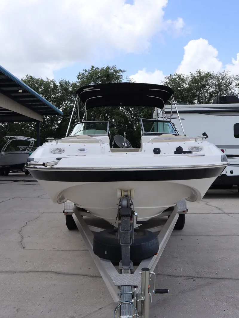 Slide: The Image of 2008 NauticStar 210 DC boat on trailer, front view. - 4
