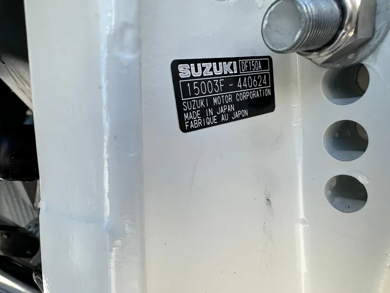 Slide: The Image of Suzuki motor label on 2025 Carolina Skiff Sea Skiff 218 EV. - 26
