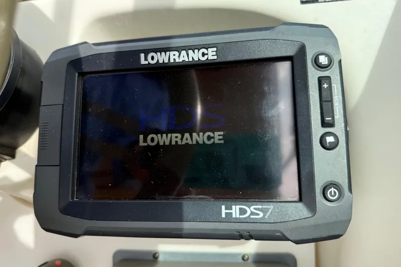 Slide: The Image of Lowrance HDS7 marine GPS on 1999 Sea Ray Sundancer 260 boat dashboard. - 12