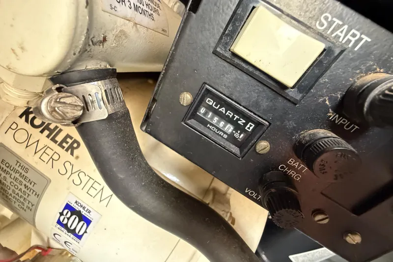 Slide: The Image of Control panel of a 1999 Sea Ray Sundancer 260 with Kohler power system. - 27