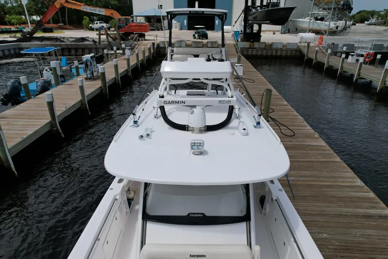 Slide: The Image of 2017 Everglades 435 Center Console boat docked at marina, aerial view. - 4