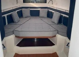 Slide: The Image of Interior cabin of 2017 Evo Yachts 43 with cushioned seating and modern design. - 24