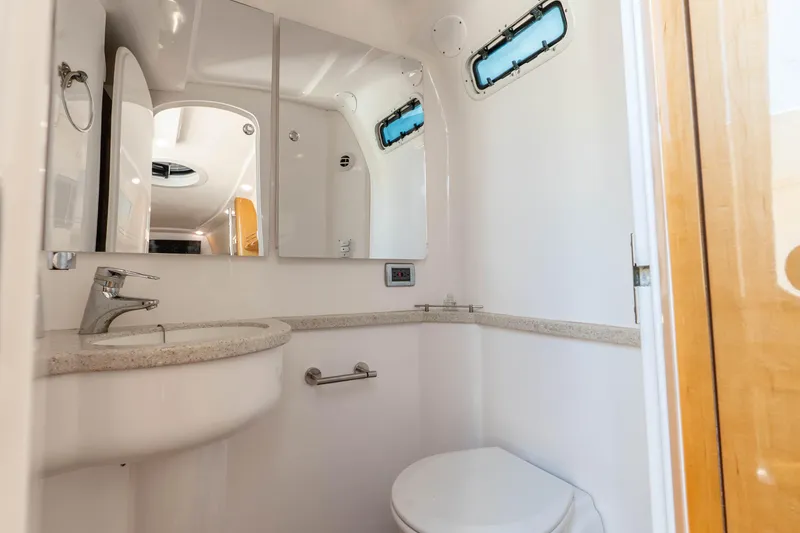 Slide: The Image of Luxurious bathroom interior of 2015 Intrepid 475 Panacea yacht with modern fixtures. - 23