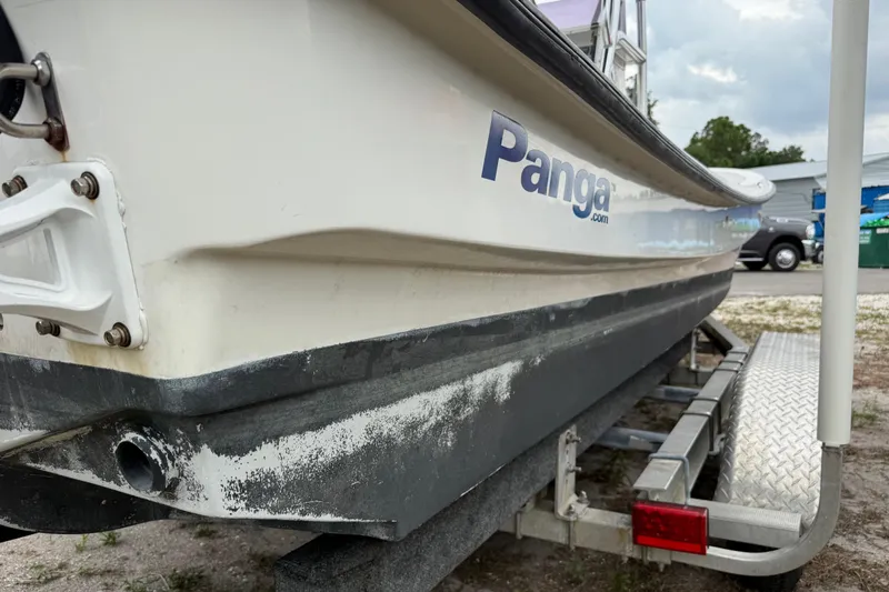 Slide: The Image of 2007 Panga 22LX boat on trailer, side view showing hull and logo. - 10