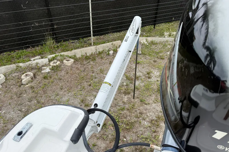 Slide: The Image of 2007 Panga 22LX boat with Power-Pole anchor system in a grassy area. - 17