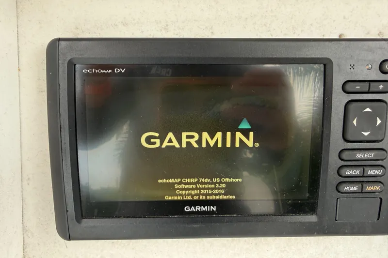 Slide: The Image of Garmin echoMAP DV on 2007 Panga 22LX boat, displaying software version 3.20. - 22