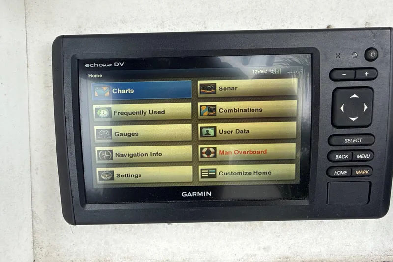 Slide: The Image of Garmin EchoMap DV on 2007 Panga 22LX displaying navigation and sonar options. - 23