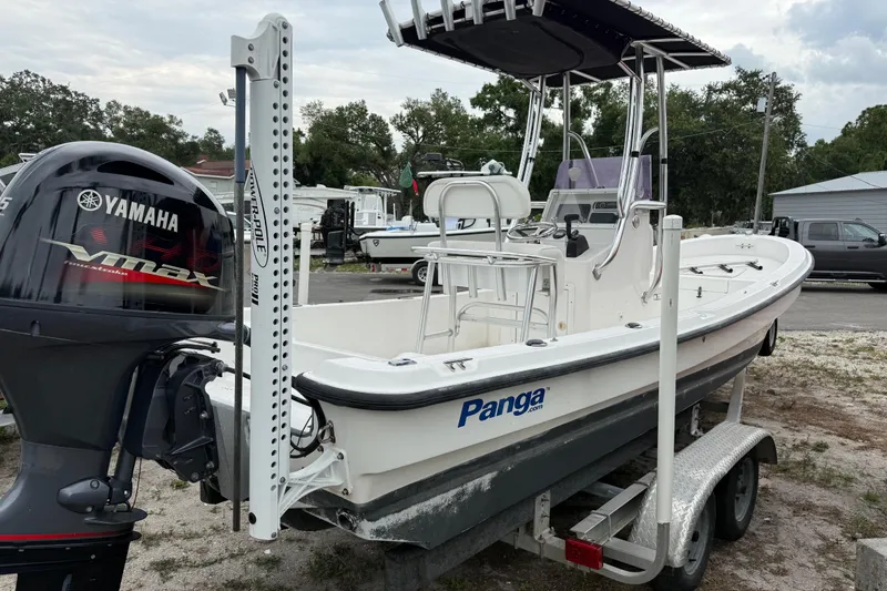 Slide: The Image of 2007 Panga 22LX boat on trailer with Yamaha VMAX engine, parked outdoors. - 3