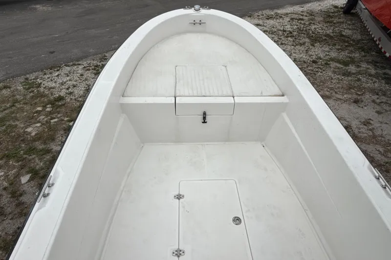 Slide: The Image of 2007 Panga 22LX boat interior, featuring spacious white deck and storage compartments. - 31