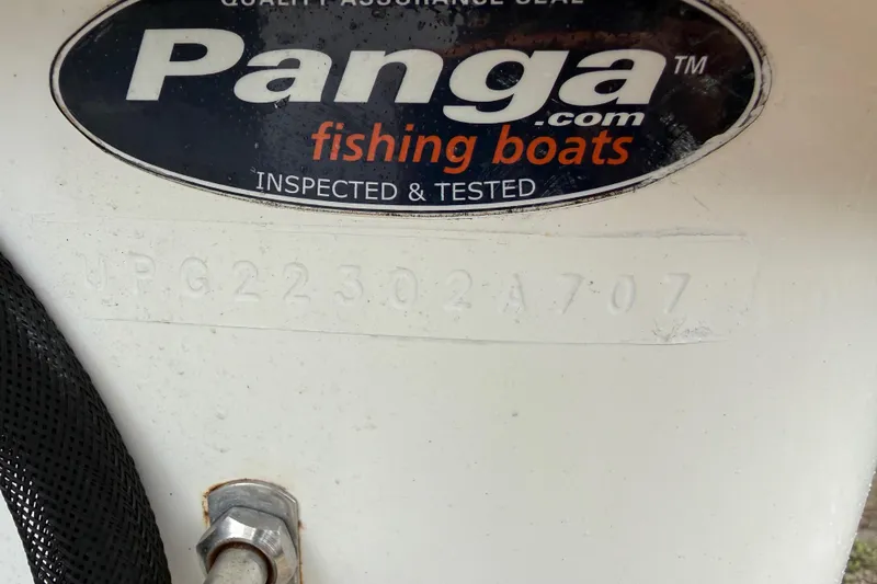 Slide: The Image of 2007 Panga 22LX fishing boat label with serial number and inspection details. - 37