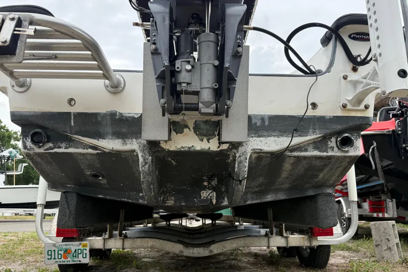 Slide: The Image of Rear view of a 2007 Panga 22LX boat on a trailer, showing the motor and hull. - 4