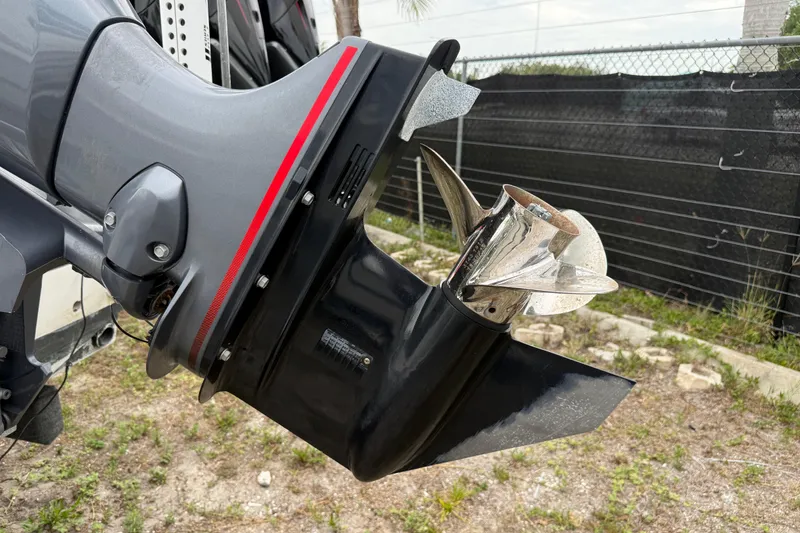 Slide: The Image of Outboard motor propeller of a 2007 Panga 22LX boat, close-up view. - 5