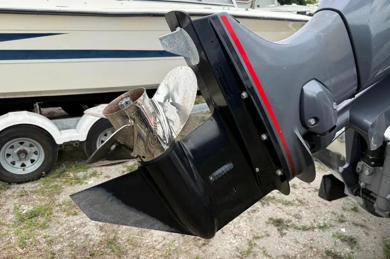 Slide: The Image of Close-up of a 2007 Panga 22LX boat motor propeller on a trailer. - 6