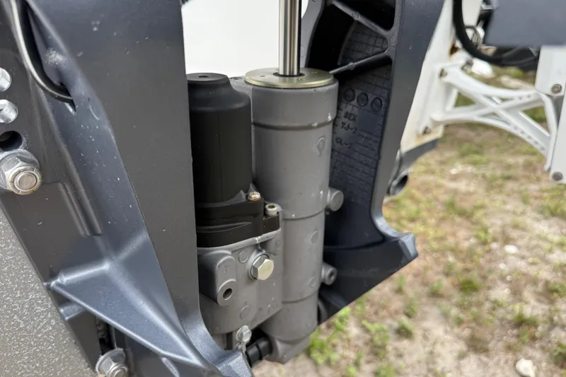 Slide: The Image of Close-up of a 2007 Panga 22LX boat engine component, showcasing mechanical details. - 7