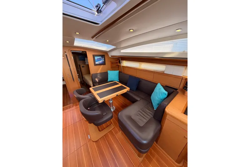 Slide: The Image of Luxurious interior of 2013 Jeanneau 57 yacht with elegant seating and modern design. - 36