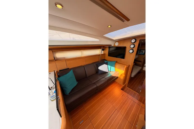 Slide: The Image of Luxurious interior of 2013 Jeanneau 57 yacht with leather seating and modern decor. - 37