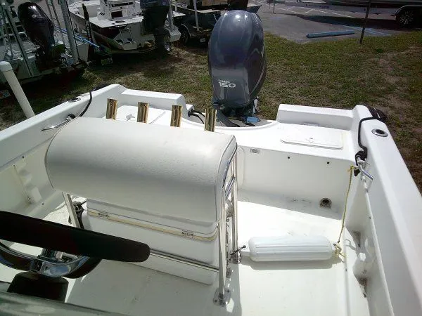 Slide: The Image of Interior of a 2007 Century 2001SV boat with outboard motor. - 3