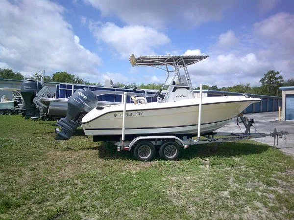 Slide: The Image of Century 2001SV boat from 2007 on trailer outdoors. - 4