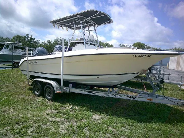 Slide: The Image of 2007 Century 2001SV boat on trailer parked outdoors. - 5
