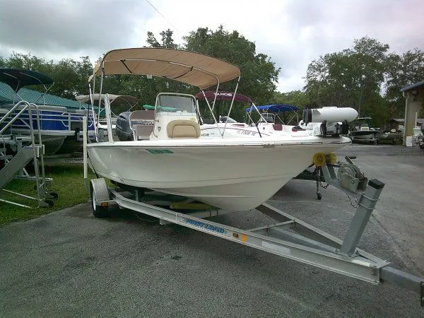 The Image of 2016 Tidewater 1910 Bay Max boat on trailer outdoors. - 1