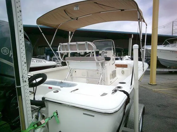 Slide: The Image of 2016 Tidewater 1910 Bay Max boat with canopy in harbor. - 4