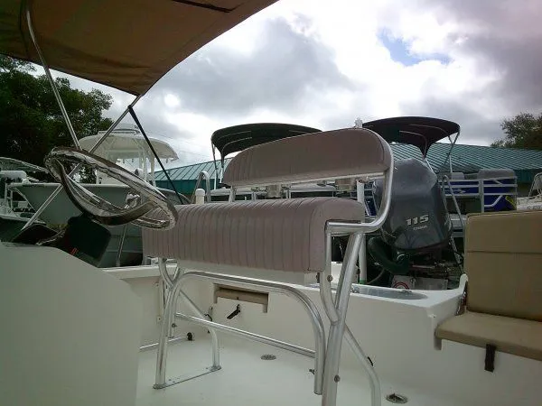 Slide: The Image of 2016 Tidewater 1910 Bay Max boat with helm and bench seat. - 6
