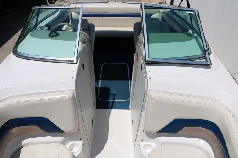 Slide: The Image of 1996 Chaparral 2330 SS boat interior with open cockpit and seating. - 22