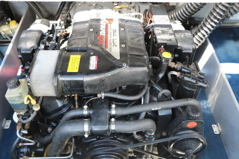 Slide: The Image of Engine of a 1996 Chaparral 2330 SS boat, showcasing detailed components and layout. - 36