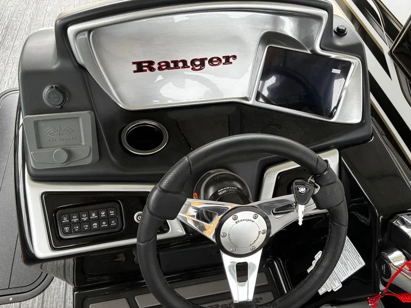Slide: The Image of Dashboard of Ranger 223FC 2026 with steering wheel and controls. - 13