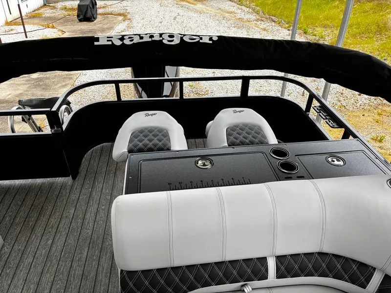 Slide: The Image of Interior of Ranger 223FC boat, 2026 model, featuring stylish seating. - 3