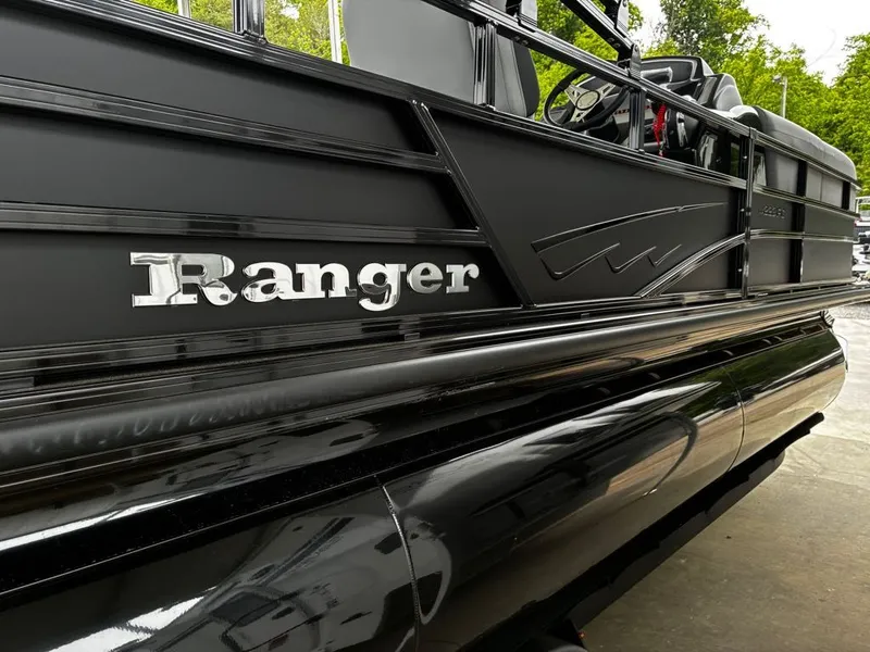 Slide: The Image of Black Ranger 223FC boat, 2026 model, side view. - 7