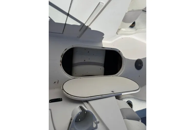 Slide: The Image of 2005 Starcraft Aurora 2210 OB boat interior storage compartment. - 16