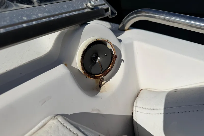 Slide: The Image of Close-up of a rusted speaker mount on a 2005 Starcraft Aurora 2210 OB boat. - 25