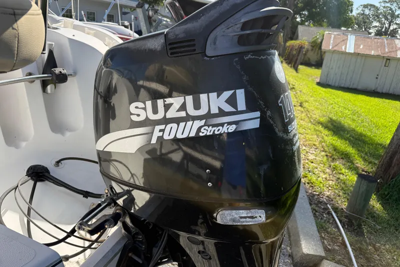 Slide: The Image of Suzuki Four Stroke outboard motor on a 2005 Starcraft Aurora 2210 OB boat. - 6
