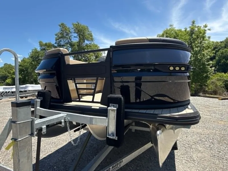 Slide: The Image of 2026 Sylvan L-3 DLZ Platnium pontoon boat on trailer. - 17